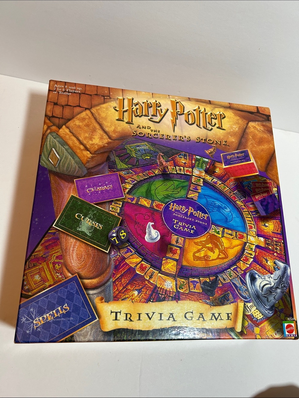 Warner Bros. Harry Potter Sorcerer's Stone Trivia Game - Purple, Gold, Blue Box